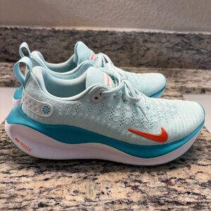 Nike Aqua and Orange Running Shoes